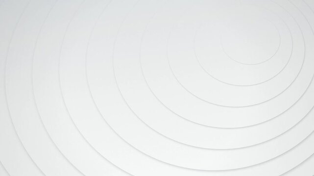 A serene pattern of expanding white concentric circles gently pulses with subtle shadows