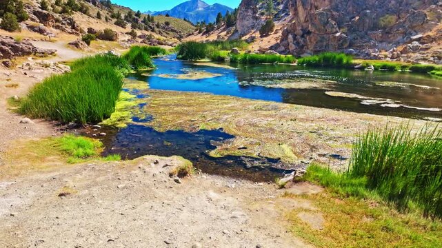 Hot Creek winds through a rocky canyon at the scenic Hot Creek Geologic Site