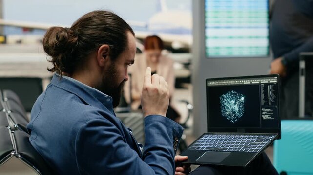 A stressed businessman uses AI and deep learning systems on a laptop in an airport lounge, facing pressure during a multinational company trip while working with machine learning algorithms.