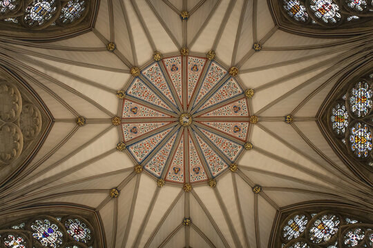 York, United Kingdom - 14 July 2026: View of the intricate vaulted ceiling of the Chapter House at York Minster, featuring elaborate stone ribbing and decorative painted panels.