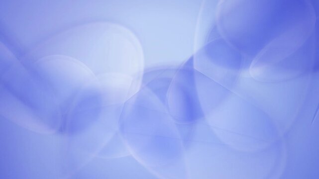 Translucent blue and lavender shapes slowly move and overlap