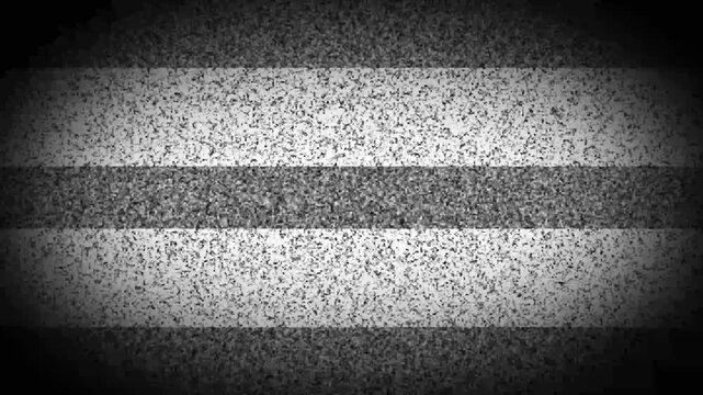 Grainy black and white television static noise background with a dark vignette effect around the edges of the screen display texture