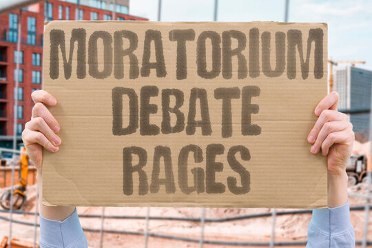 "Moratorium Debate Rages" Experts argue over halting mining until risks are clear. DEBATE. MORATORIUM. MINING. RISK. PRECAUTION.