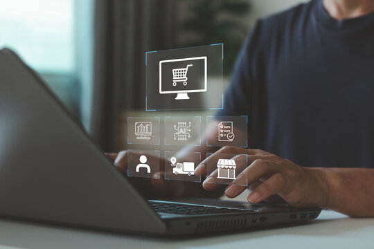 Businessman using laptop with digital ecommerce interface online shopping, AI analytics, customer management, logistics, retail automation, procurement, modern digital commerce and business technology