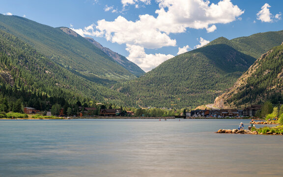 Georgetown Lake and Shoreline, Colorado under sunny day with fluffy clouds