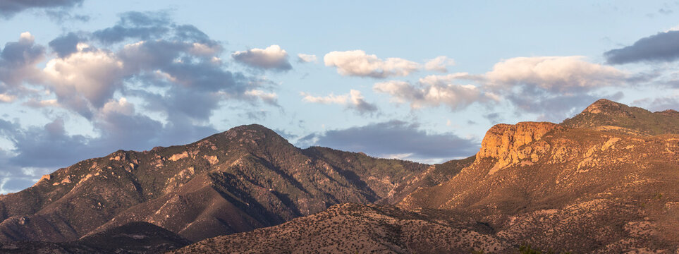 A few clouds over two of the peaks in the Huachuca Mountains in Arizona