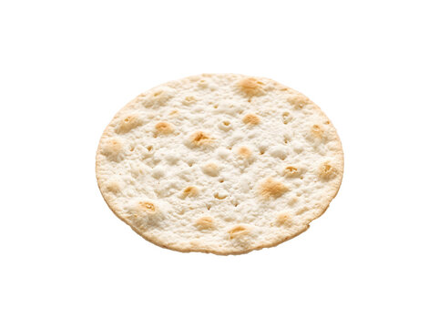 Round Matzah Cracker or Unleavened Flatbread with Toasted Texture Isolated on Black Background for Jewish Holiday Passover Seder or Healthy Snack Product Layouts