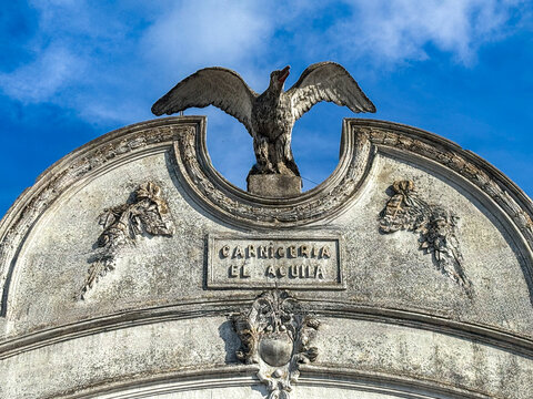 Pilar, historic Carniceria El Aguila butcher shop facade with eagle sculpture - Buenos Aires Argentina