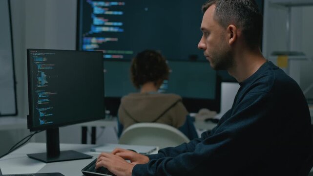 software developer talk strategy plan to executive write prompt AI bot IT app program data analytics in tech startup office.Projected visuals and glowing code on screen.AI chatbot technology concept