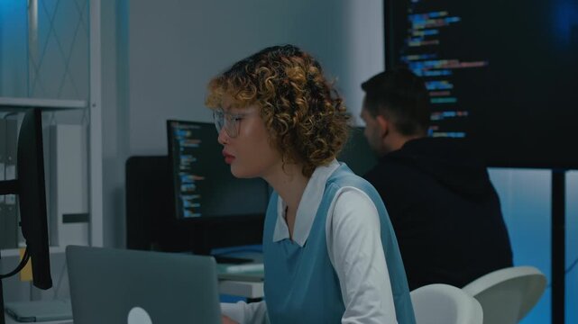 software developer talk strategy plan to executive write prompt AI bot IT app program data analytics in tech startup office.Projected visuals and glowing code on screen.AI chatbot technology concept