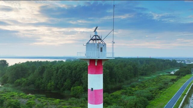 Hefei Chaohu Binhu Pier Lighthouse Aerial: Red-and-White Tower Amid Greenery, Lake and Mountains in Distance
