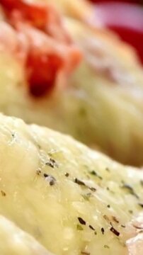 Close-up of Delicious Freshly Baked Pizza Crust with Herbs