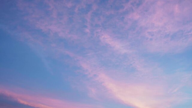 pink clouds in blue sky