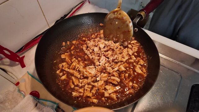 Vegetarian Mapo Tofu Stir Fry in Black Iron Wok with Sichuan Spices