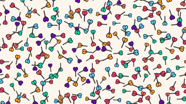 A vibrant and playful animation featuring a dense pattern of multi-colored heart-shaped lollipops shaking on a cream background.