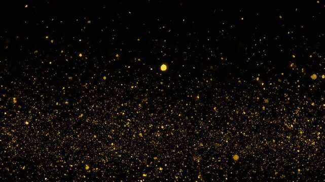 Sparkling golden particles and dust rising from the bottom against a dark background, perfect for celebratory video overlays.
