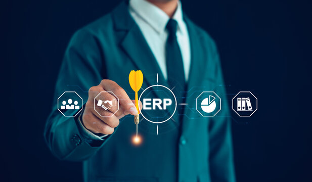 Business professional optimizing ERP implementation for enterprise resource planning, workflow automation, business strategy, digital transformation, data management, and operational performance.