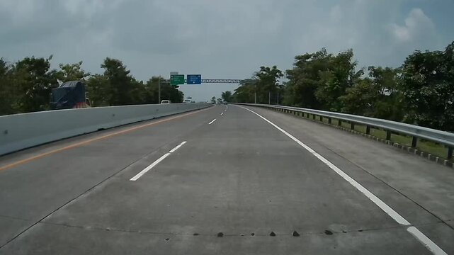 4K Rear Dashcam Footage of Vehicles Traveling on the Main Malang&ndash;Surabaya Toll Road, East Java, Indonesia