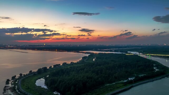 Hefei Chaohu Binhu Pier Aerial Timelapse: Golden Light on Lake, Lighthouse and City Silhouette Paint Dusk Canvas