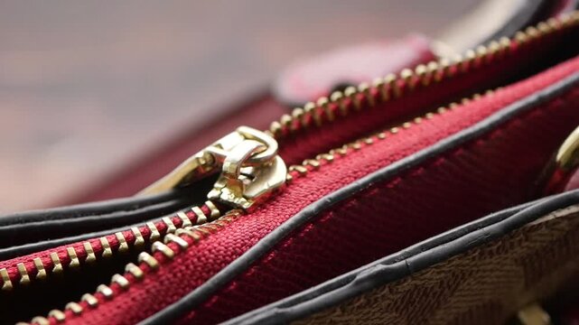 Close up of a broken zipper on a bag 