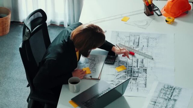 Top view of smart business woman walking and give house design. Aerial view of architect engineer looking at blueprint and building structure at table with safety helmet and house model. Alimentation.