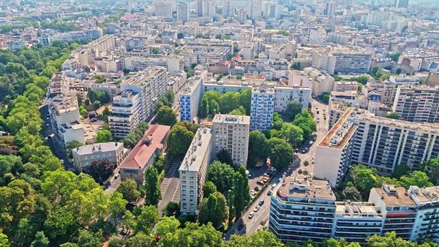 Paris is a dense capital defined by classic Haussmannian apartment blocks, zinc rooftops, tree-lined boulevards, and distinct residential neighborhoods. Notably many public parks as shown here.