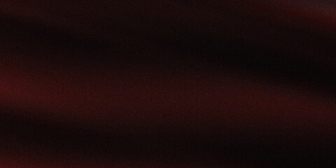 Dark textured background with subtle deep red light bleeding across grainy surface area. © faruk