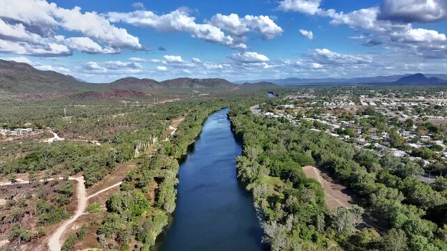 Spectacular aerial  footage of Ross River Townsville Queensland Australia with approaching storm