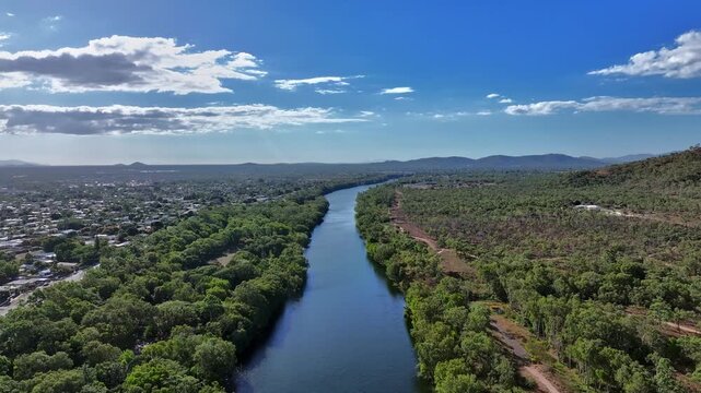 Spectacular aerial  footage of Ross River Townsville Queensland Australia with approaching storm