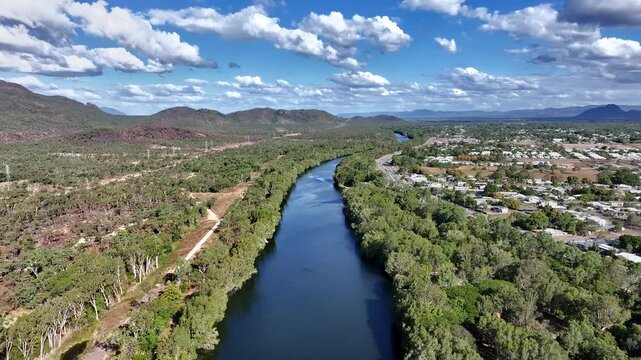 Spectacular aerial  footage of Ross River Townsville Queensland Australia with approaching storm