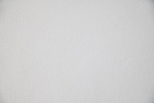 White Concrete Wall Texture with Fine Grain Stucco Surface for Design Background.