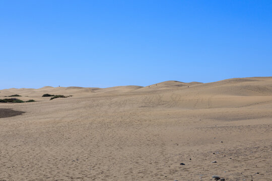 Panorama view of Maspalomas Dunes with footprints on Canary Island Gran Canaria, Spain