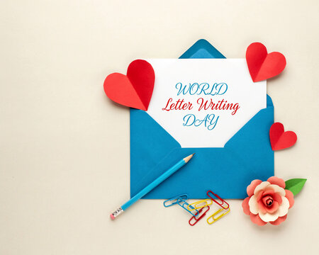 World letter writing day celebration flatlay with envelope and paper hearts envelope stationery communication greeting correspondence romantic decoration