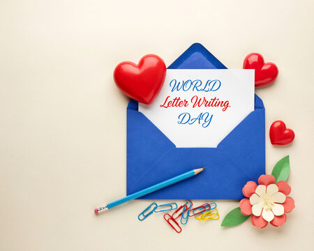 World letter writing day concept with blue envelope and red hearts envelope stationery communication greeting creative correspondence romantic decoration
