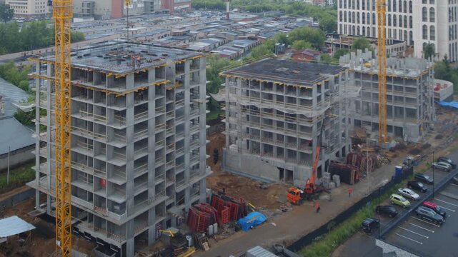 Construction incident. Small element of the building falls from the top floor to the ground. Nobody is injured