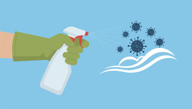 Hand in green glove using antibacterial spray to clean away floating virus cells.