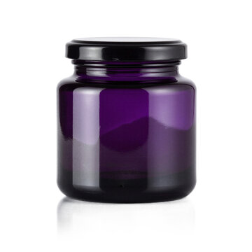 Purple glass jar isolated on a transparent background for cosmetic cream or luxury skincare product mockup packaging