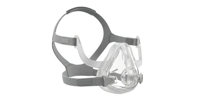 CPAP Mask: A clear plastic full-face CPAP mask with grey adjustable straps, designed for sleep apnea treatment and respiratory support.
