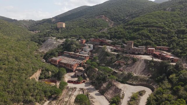Famous Abandoned Miniera di Sanna Within Montevecchio Mining Complex In Southwestern Sardinia, Italy. Aerial Drone Shot