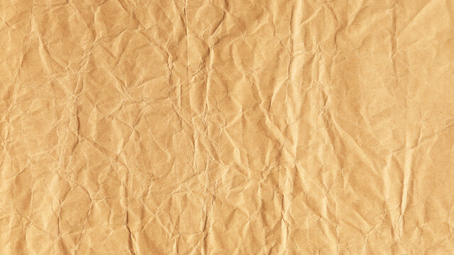 Brown crumpled paper texture with macro closeup details
