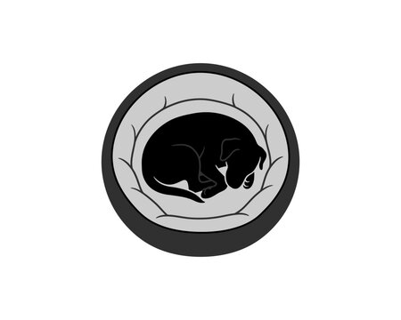 Silhouette sleeping dog curled up in a cozy circle