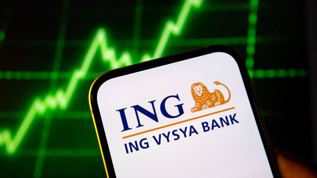 Ing vysya bank logo on mobile screen with green financial trend line background banking sector growth concept.