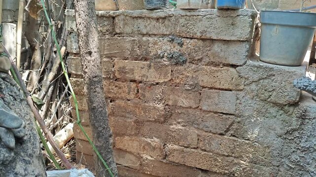 Applying Cement Mortar onto Old Brick Wall for Plastering