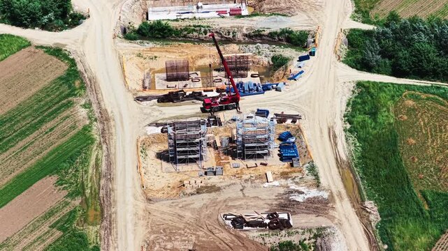 Aerial view of highway bridge construction site
