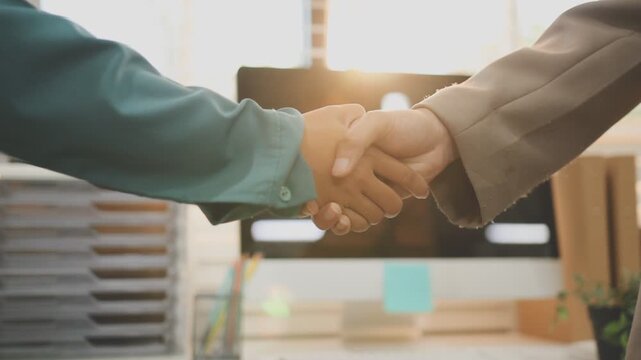 businessman handshake for teamwork of business merger and acquisition