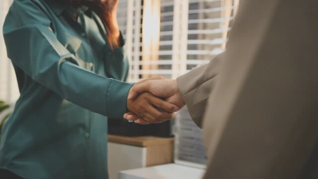 businessman handshake for teamwork of business merger and acquisition