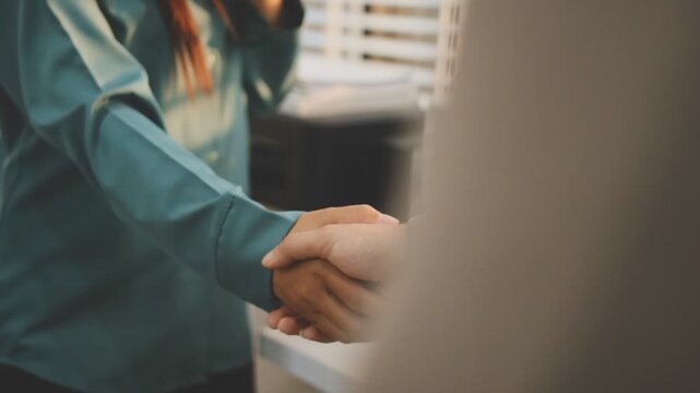 businessman handshake for teamwork of business merger and acquisition