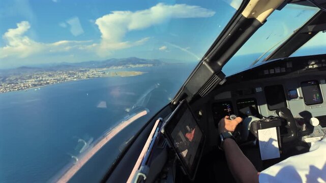 An immersive real time flight to Nice airport during the final approach to the runway 04 through the pilot&rsquo;s eyes. blurred background 4K shot.