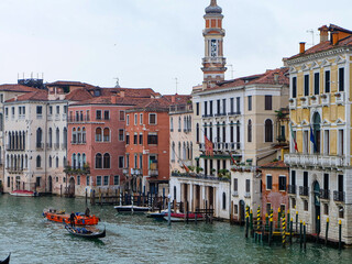 The city of Venice and the view of the Grand  Canal with ferry boat, gondola and water taxi from Rialto bridge  © PaBou