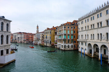 The city of Venice and the view of the Grand  Canal with ferry boat, gondola and water taxi from Rialto bridge  © PaBou